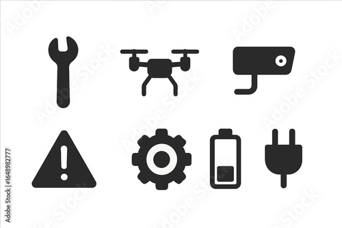 Icons representing tools, technology, and caution in a digital design suitable for informational purposes
