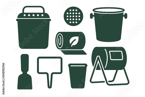 Collection of gardening tools and supplies for outdoor planting and maintenance activities in a backyard setting