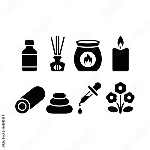 Collection of spa and wellness icons including a bottle diffuser candle and stones silhouette isolated on white background