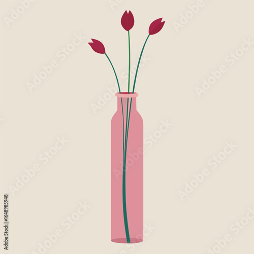 Pink glass vase with three red tulip flowers