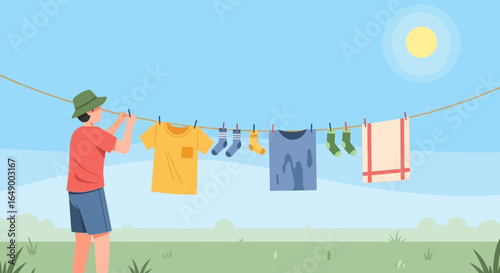 Man Hanging Clothes On Clothesline Under The Sun In A Simple Countryside