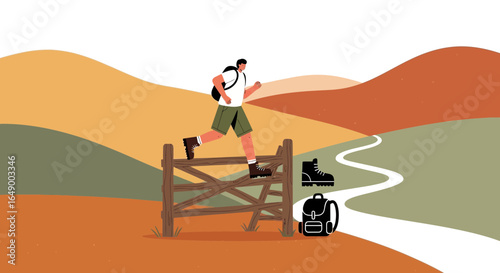 Man Hiking Across Countryside Jumping Over Rustic Wooden Fence in Autumn