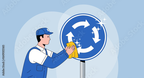 Man Cleans A Roundabout Sign With Yellow Cloth For Street Maintenance