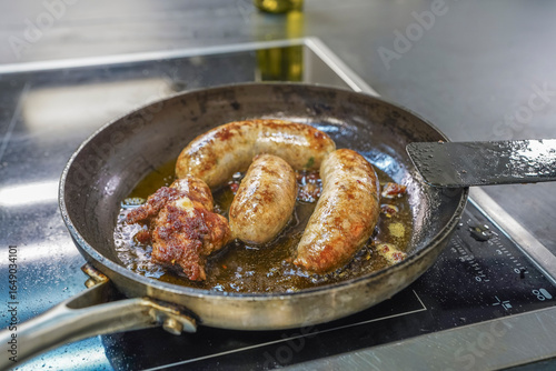 Danish national dish, organic pig medister sausage, fried with organic butter in a pan