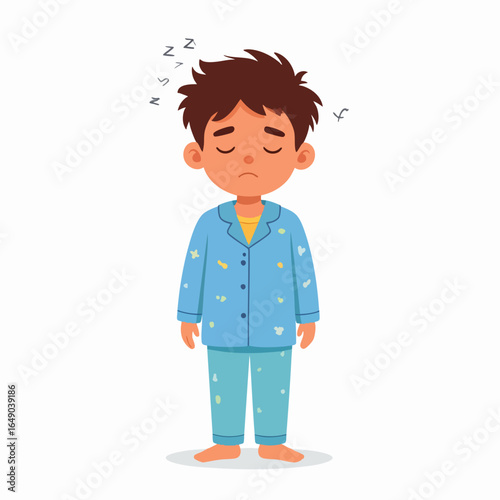 Sleepy boy in pajamas, looking tired and sad.