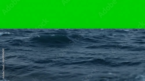 Rough Open Sea with Choppy Waves Against a Green Screen Background
