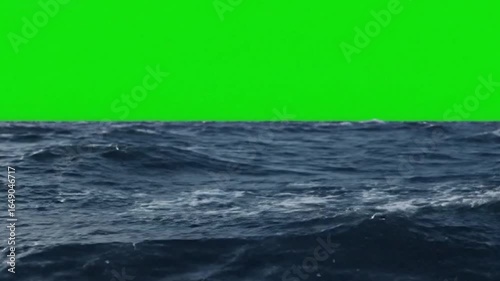 Rough Open Sea with Choppy Waves Against a Green Screen Background
