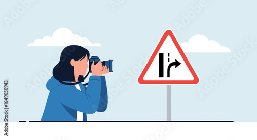 Photographer Snapping Picture Of Roadside Directional Symbol Under Cloudy Skies