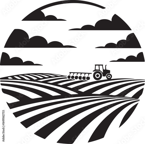 Tractor plowing field under cloudy sky, agricultural scene