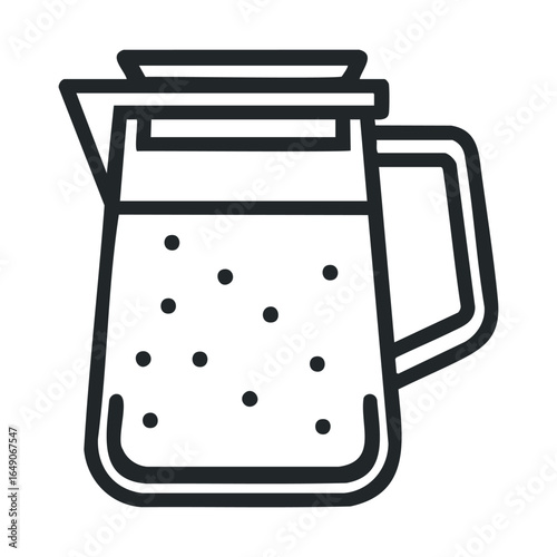 Stylish glass pitcher with iced beverage for summer gatherings