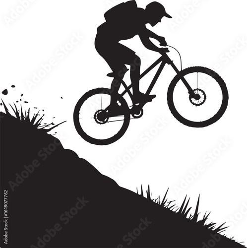 Dynamic cyclist jumps downhill extreme sport action silhouette