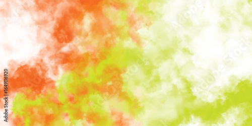 Abstract watercolor style background featuring blended orange yellow and white paint in textured cloud like patterns artistic backdrop for design projects.