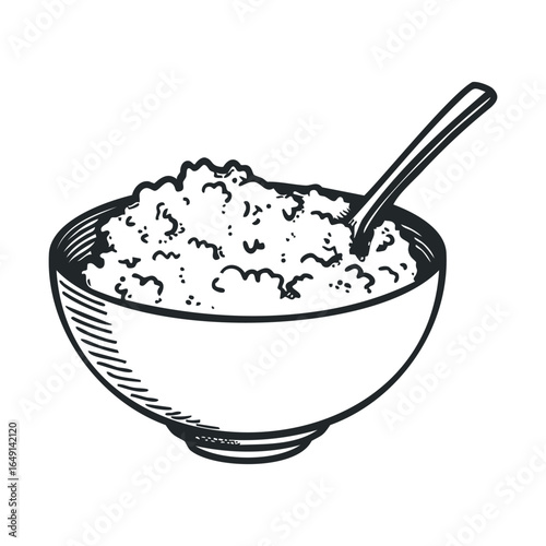 Bowl of creamy mashed potatoes with a spoon for comfort food