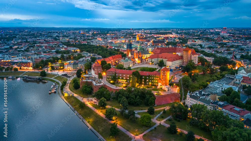 Fototapeta premium aerial view of krakow center and wawel royal castle at sunset in summer in poland