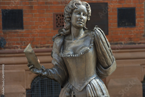 A statue of Aphra Behn, historical figure who was a female spy in the 17th century in Canterbury Cathedral