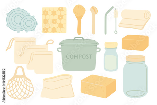 Kitchen supplies for sustainable living featuring compost bin and reusable items arranged on a light background