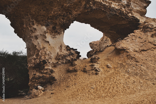 Close-up view of a natural rock arch at Lago dos Arcos, Angola