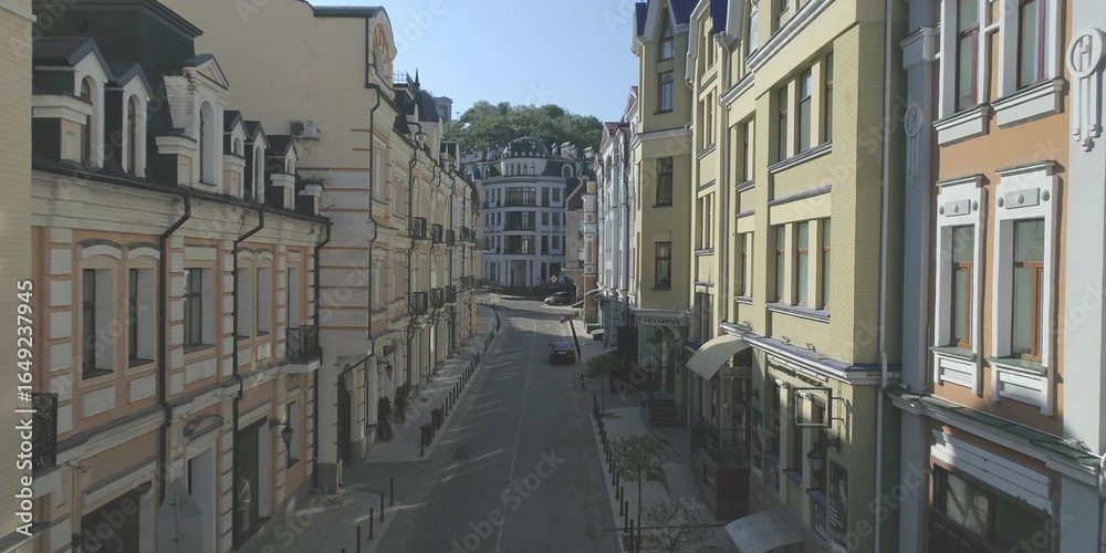 Fototapeta premium European narrow street in small town with fancy houses