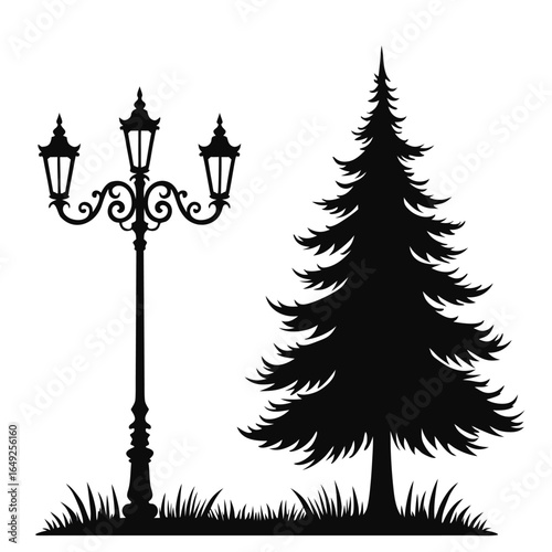 Black silhouette of ornate street lamp and pine tree