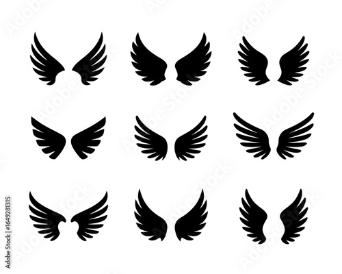 Collection of nine black wing silhouettes isolated on white background