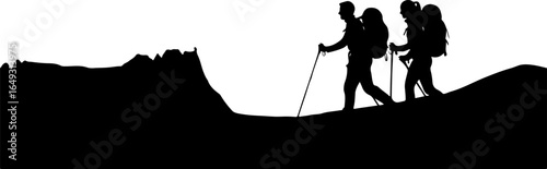 Silhouette of hikers with backpacks trekking through mountains for adventure outdoor tourism travel