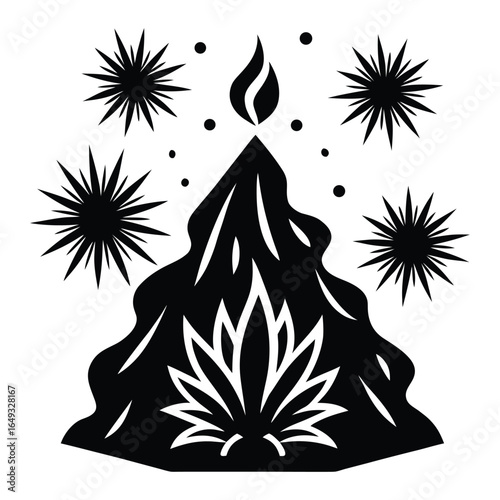 Silhouette of a large bonfire with vibrant fireworks exploding in a night sky