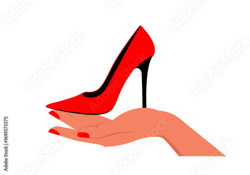 A woman's hand holds a red high-heeled shoe.