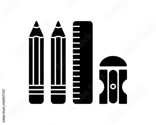 Two pencils a ruler and a pencil sharpener silhouette isolated on white background
