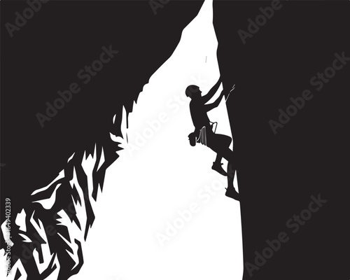 Determined climber scales challenging rock face in silhouette