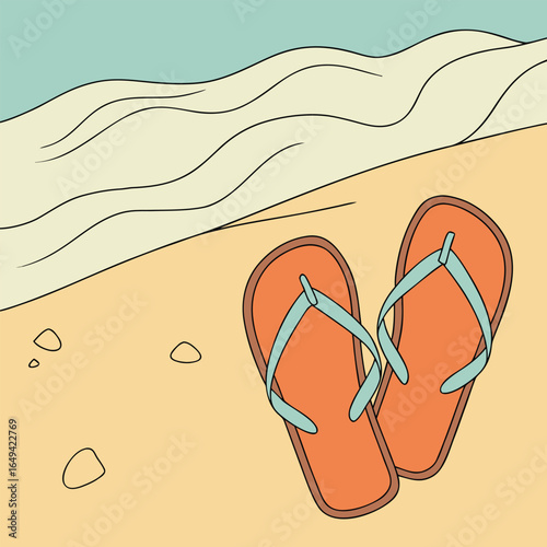 A pair of orange flip flops on a sandy beach by the ocean