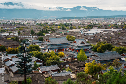 Mufu Palace in Lijiang Old Town with Mountains in the Background