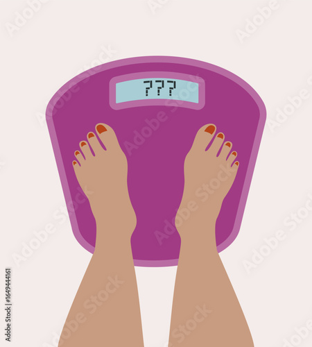 Standing on digital bathroom scale, measuring one's weight.