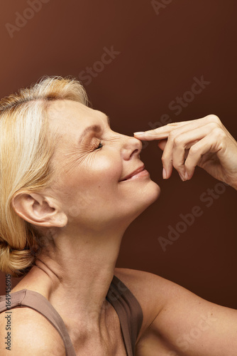 Wallpaper Mural Senior woman radiates beauty and joy with a warm smile and gentle touch in a serene setting Torontodigital.ca