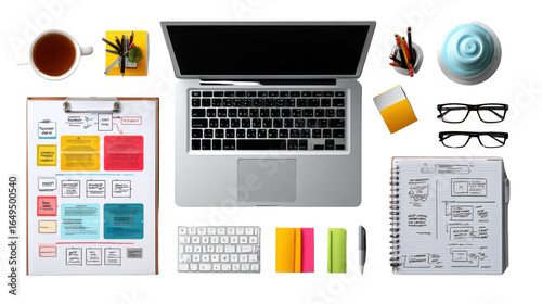 Workspace for Ideation: A top-down view of a modern workspace, filled with essential tools such as a laptop, and notepad, illustrating creative collaboration and the essence of planning. 