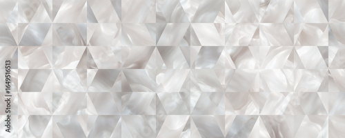 Elegant mother-of-pearl inspired geometric tile pattern with soft white, cream, and silver tones creating a luxurious abstract background.