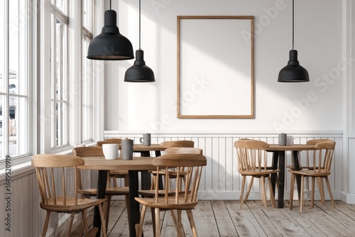 White cafe interior with wooden furniture and black pendant lights