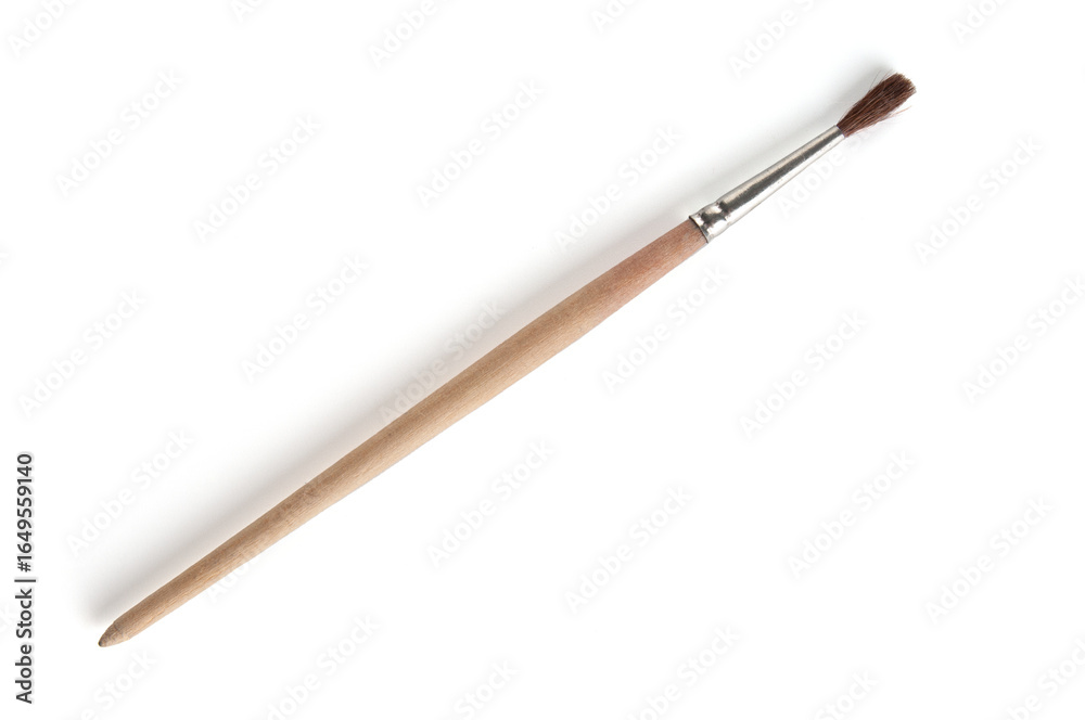 Naklejka premium Paint brush close up isolated on white background