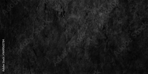 Abstract black wall texture for pattern background, well use as back drop black gradient frame, dirty dark raw cement wall texture and background, wide panorama picture black wall texture.