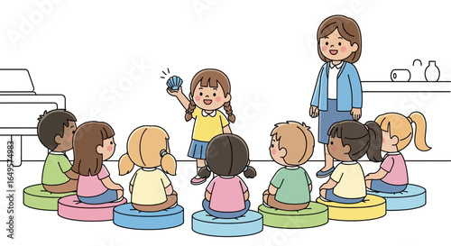 Young girl presents a small object to classmates during a lesson, teacher watches.