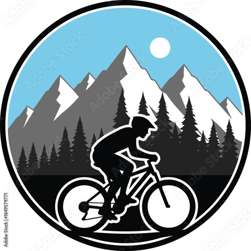 Mountain biker riding through a forest with snowy peaks