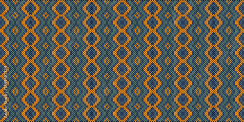 Orange diamond pattern on knitted fabric