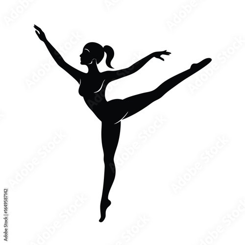 Silhouette of a ballerina performing an arabesque pose