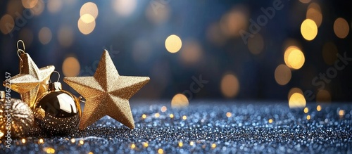 Festive Christmas ornaments on a dark blue glitter background with bokeh lights