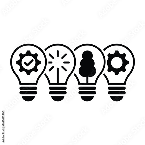 Four light bulbs showing different concepts including a gear sun tree and gear