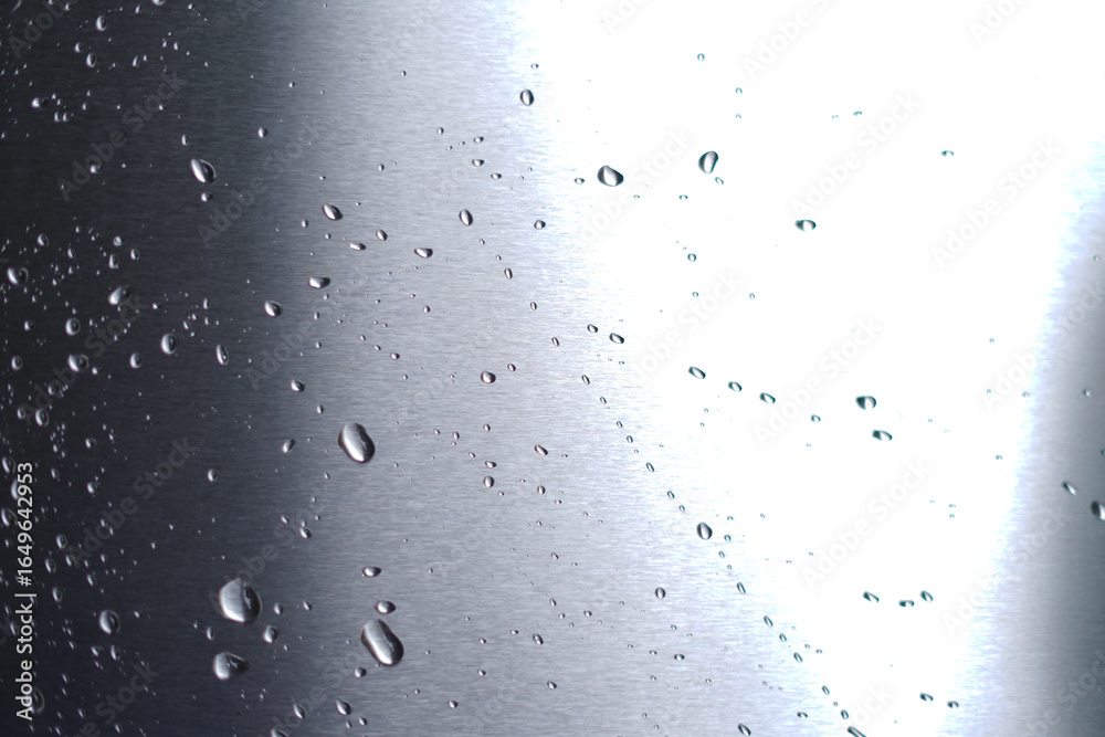Obraz premium Waterdrops Texture on Metal and Glass Surface Closeup.