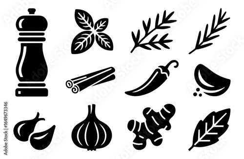 Collection of kitchen essentials: pepper grinder, various herbs, spices and a garlic
