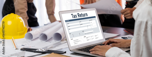Online tax return form for submitting individual income tax return form brisk on the internet website. Government web for tax payment and return. Taxation technology concept.