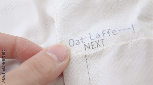 Close-up of Oat Laffe Next Clothing Label
