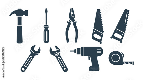 Tools in harmony: A collection of essential hand tools, including a hammer, screwdriver, pliers, saws, wrench, drill, and measuring tape. This image encapsulates craftsmanship.