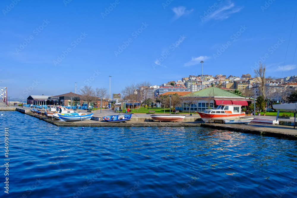 Fototapeta premium Bandirma, Turkey - February 7, 2024: Marina and embankment on sunny day